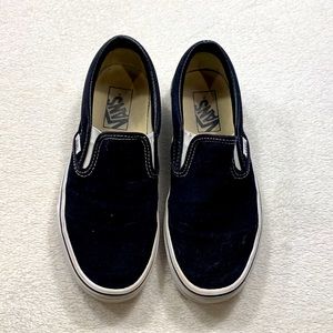 Women’s black slip on Vans size 7.